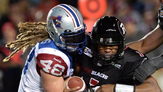 Bear Woods tackles Henry Burris