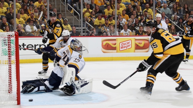 Ron Hainsey scores on Jusse Saros, Dave Sandford/National Hockey League/Getty Images Ron Hainsey scores on Jusse Saros