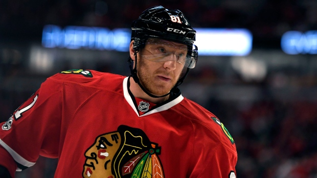 Hossa stretchered off for Red Wings; OK after hospital visit