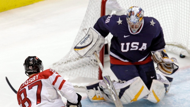 Sidney Crosby scores on Ryan Miller, The Canadian Press Sidney Crosby scores on Ryan Miller