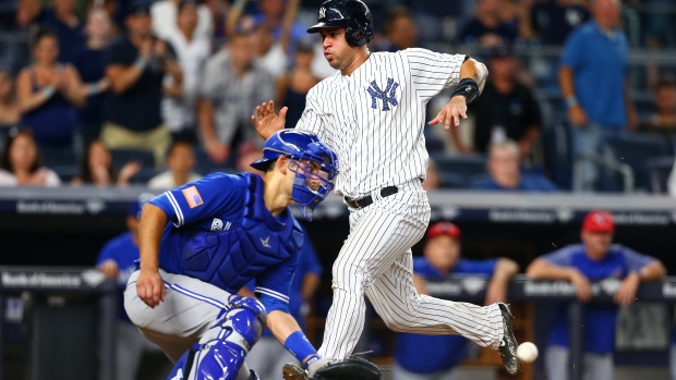 Gary Sanchez and Luke Maile, Mike Stobe/Getty Images Gary Sanchez and Luke Maile