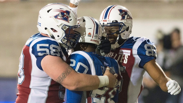 Tyrell Sutton and Alouettes celebrate