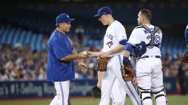 John Gibbons and Aaron Sanchez, Tom Szczerbowski/Getty Images John Gibbons and Aaron Sanchez