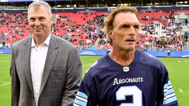 Randy Ambrosie and Doug Flutie, The Canadian Press Randy Ambrosie and Doug Flutie