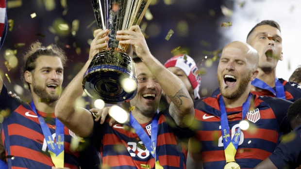 USA soccer celebrates, The Canadian Press USA soccer celebrates
