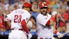 Aaron Altherr and Cameron Rupp celebrate