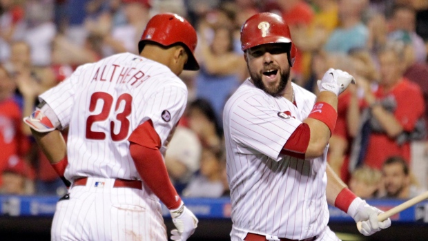 Aaron Altherr and Cameron Rupp celebrate