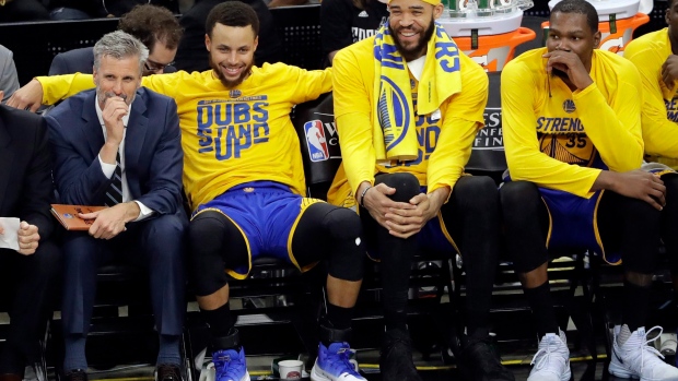 Steph Curry, JaVale McGee, Kevin Durant, The Canadian Press Steph Curry, JaVale McGee, Kevin Durant