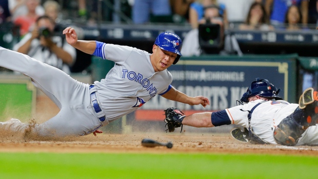 Rob Refsnyder evades Brian McCann's tag