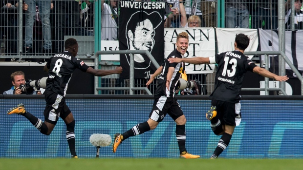 Borussia Moenchengladbach players celebrate