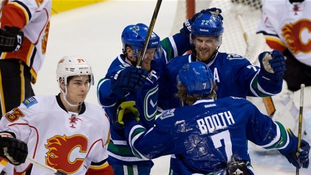 Vancouver Canucks celebrate, The Canadian Press Vancouver Canucks celebrate
