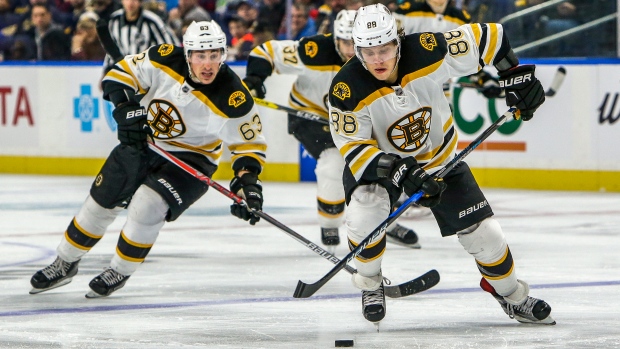 Marchand and Pastrnak, Icon Sportswire/Icon Sportswire/Getty Images Marchand and Pastrnak