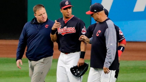 Michael Brantley with Terry Francona and trainer