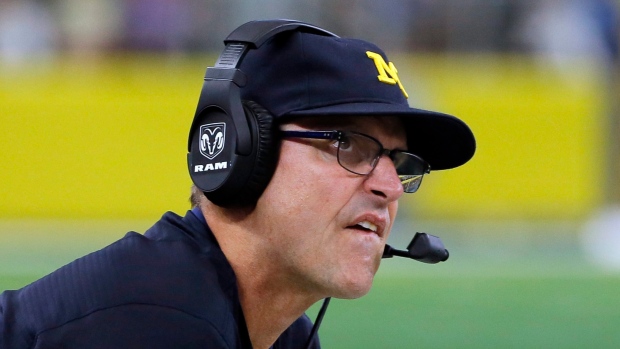 Jim Harbaugh , The Canadian Press Jim Harbaugh