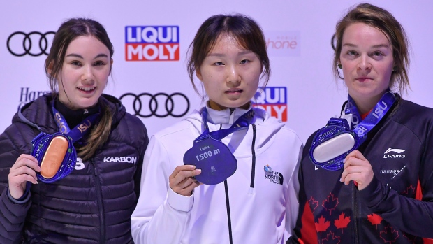 Kim Boutin, right, with her silver medal