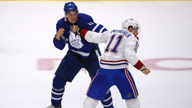 Hyman fights Gallagher, The Canadian Press Hyman fights Gallagher