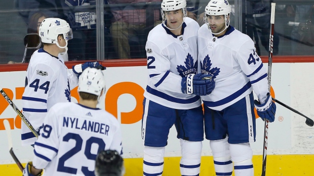 Patrick Marleau and Nazem Kadri celebrate