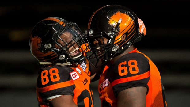 Shaq Johnson and Kelvin Palmer celebrate, The Canadian Press Shaq Johnson and Kelvin Palmer celebrate