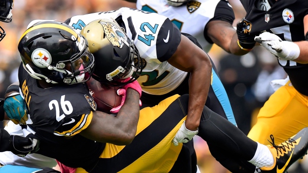 Le'Veon Bell and Barry Church, The Canadian Press Le'Veon Bell and Barry Church