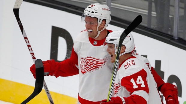 Gustav Nyquist and Anthony Mantha celebrate goal