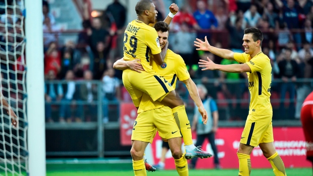 Thomas Meunier, PSG celebrate, ROMAIN LAFABREGUE/AFP/Getty Images Thomas Meunier, PSG celebrate