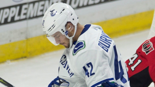 Alex Burmistrov and Chris Tanev, The Canadian Press Alex Burmistrov and Chris Tanev