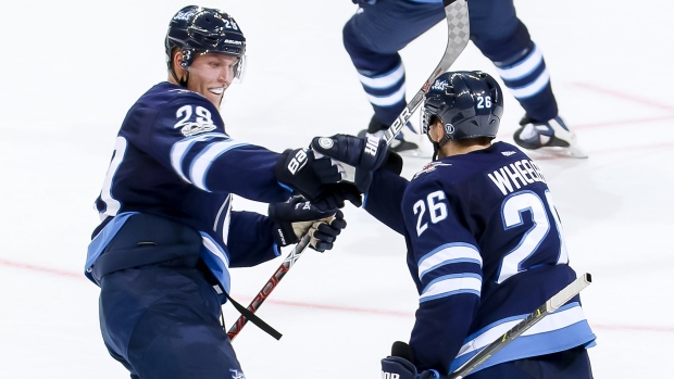 Patrik Laine and Blake Wheeler , Jonathan Kozub/National Hockey League/Getty Images Patrik Laine and Blake Wheeler