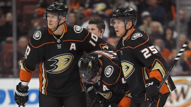 Cam Fowler helped off ice, The Canadian Press Cam Fowler helped off ice