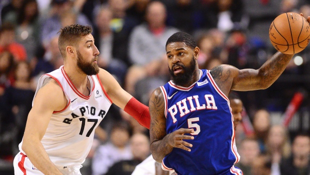 Amir Johnson and Jonas Valanciunas, The Canadian Press Amir Johnson and Jonas Valanciunas