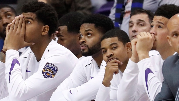 Phoenix Suns' despondent bench, The Canadian Press Phoenix Suns' despondent bench