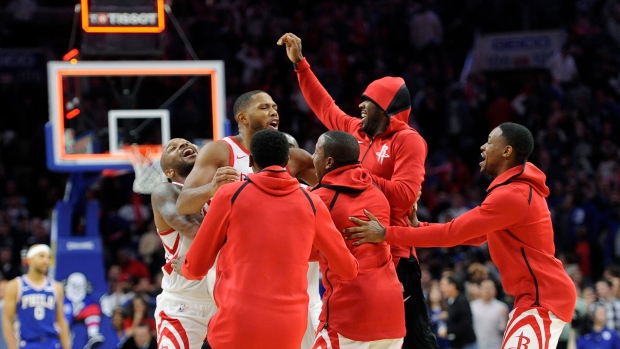 Houston Rockets celebrate, The Canadian Press Houston Rockets celebrate