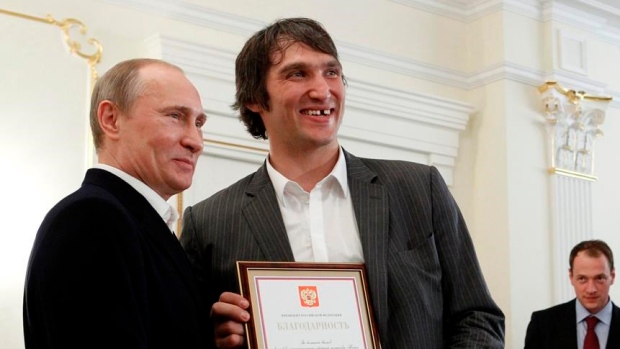 Alex Ovechkin and Vladimir Putin, The Canadian Press Alex Ovechkin and Vladimir Putin