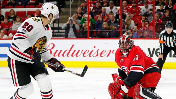Brandon Saad and Scott Darling, The Canadian Press Brandon Saad and Scott Darling