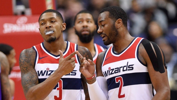 Bradley Beal, left, John Wall, right