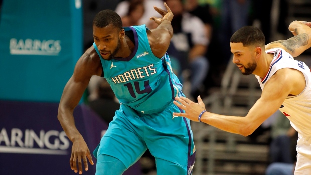 Michael Kidd-Gilchrist and Austin Rivers,, The Canadian Press Michael Kidd-Gilchrist and Austin Rivers,