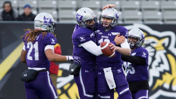 Western celebrates touchdown, The Canadian Press Western celebrates touchdown