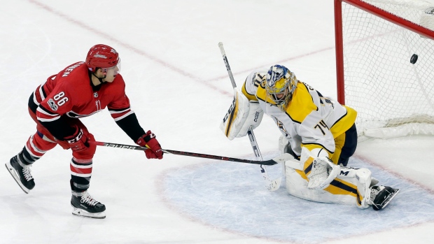 Teuvo Teravainen and Juuse Saros, The Canadian Press Teuvo Teravainen and Juuse Saros