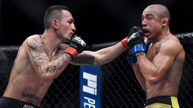 Max Holloway Jose Aldo, The Canadian Press Max Holloway Jose Aldo