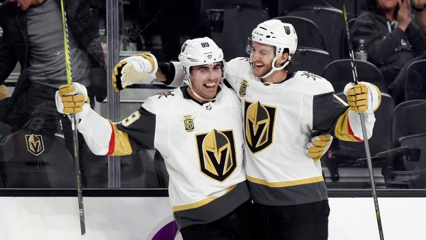Alex Tuch and Colin Miller celebrate goal, The Canadian Press Alex Tuch and Colin Miller celebrate goal