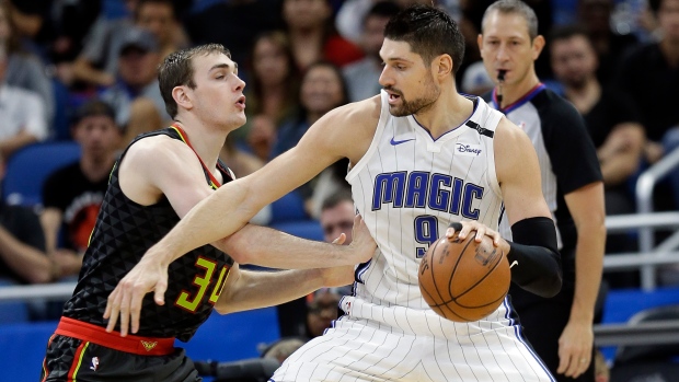 Tyler Cavanaugh Nikola Vucevic, The Canadian Press Tyler Cavanaugh Nikola Vucevic