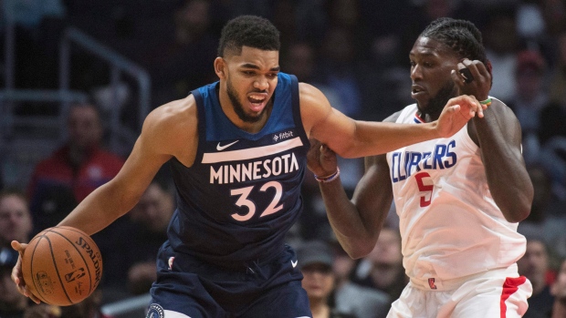 Karl-Anthony Towns Montrezl Harrell, The Canadian Press Karl-Anthony Towns Montrezl Harrell