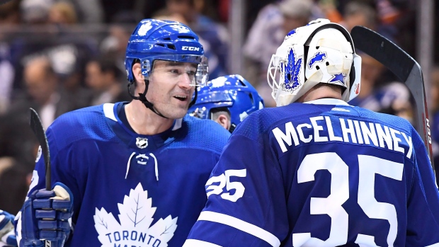 Curtis McElhinney and Patrick Marleau, The Canadian Press Curtis McElhinney and Patrick Marleau