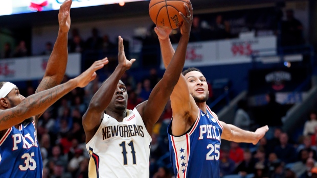 Jrue Holiday Ben Simmons, The Canadian Press Jrue Holiday Ben Simmons