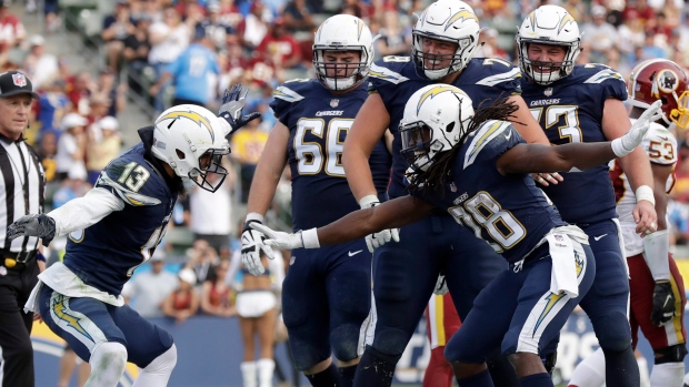 Melvin Gordon and Keenan Allen celebrate, The Canadian Press Melvin Gordon and Keenan Allen celebrate