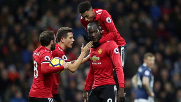 Romelu Lukaku, Manchester United players celebrate, The Canadian Press Romelu Lukaku, Manchester United players celebrate