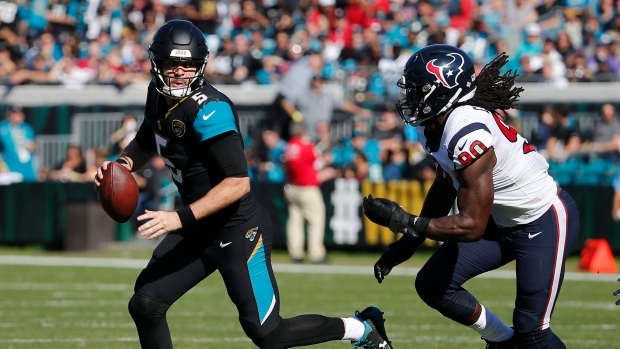 Clowney chases Bortles, The Canadian Press Clowney chases Bortles