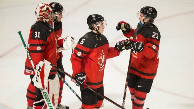 Carter Hart, Victor Mete, Josh Mahura, The Canadian Press Carter Hart, Victor Mete, Josh Mahura