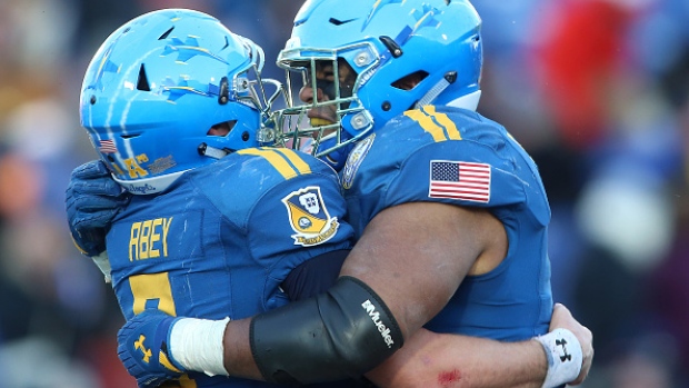 Zach Abey and Evan Martin , Tony Quinn/Icon Sportswire via Getty Images Zach Abey and Evan Martin