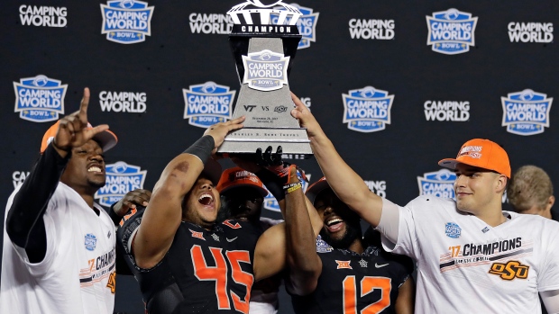 Oklahoma State celebrates, The Canadian Press Oklahoma State celebrates