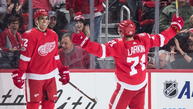 Andreas Athanasiou and Dylan Larkin celebrate goal
